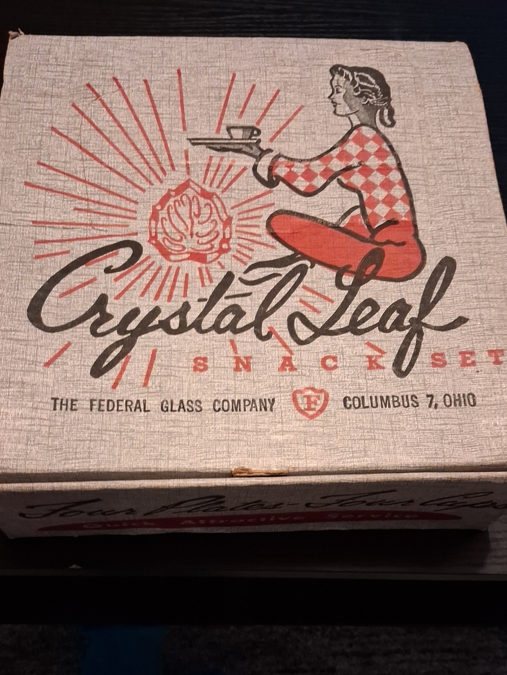 Four Glass Plates And Four Glass Cups